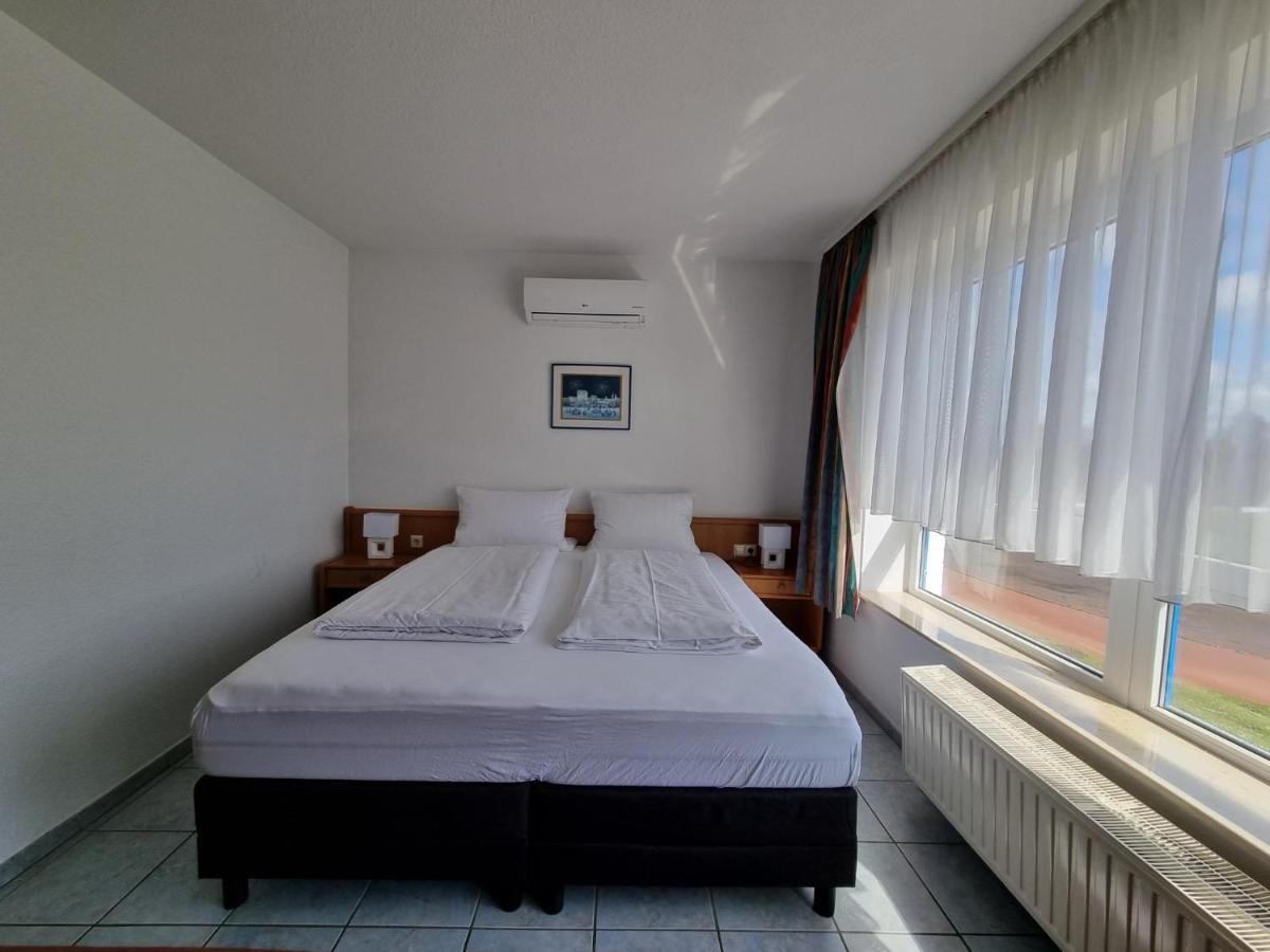Erbenholz Hotel Laatzen Buitenkant foto
